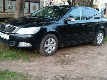 Черный Шкода Октавия, объемом двигателя 1.6 л и пробегом 220 тыс. км за 11500 $, фото 1 на Automoto.ua