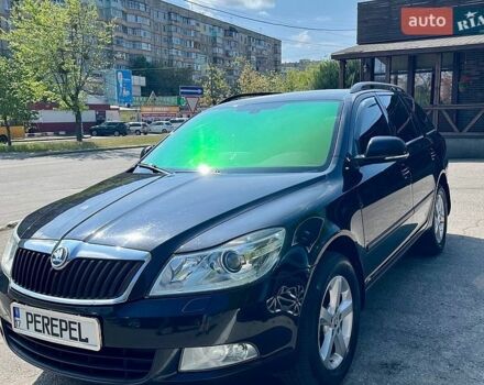 Черный Шкода Октавия, объемом двигателя 1.6 л и пробегом 223 тыс. км за 10000 $, фото 1 на Automoto.ua