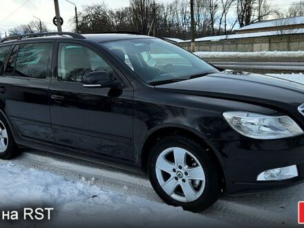 Чорний Шкода Октавія, об'ємом двигуна 2 л та пробігом 153 тис. км за 7800 $, фото 1 на Automoto.ua