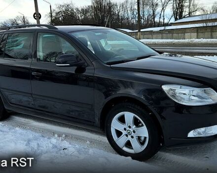Черный Шкода Октавия, объемом двигателя 2 л и пробегом 153 тыс. км за 7800 $, фото 1 на Automoto.ua