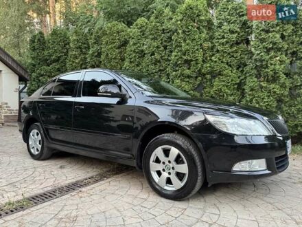 Черный Шкода Октавия, объемом двигателя 1.8 л и пробегом 160 тыс. км за 7500 $, фото 1 на Automoto.ua