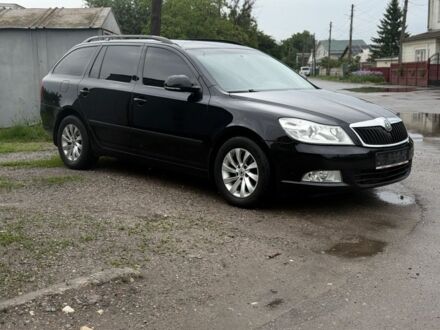 Черный Шкода Октавия, объемом двигателя 1.6 л и пробегом 235 тыс. км за 7650 $, фото 1 на Automoto.ua