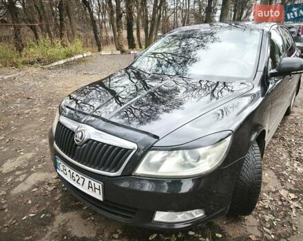 Черный Шкода Октавия, объемом двигателя 1.8 л и пробегом 156 тыс. км за 8500 $, фото 1 на Automoto.ua