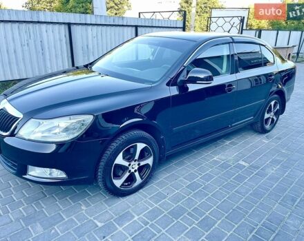 Чорний Шкода Октавія, об'ємом двигуна 1.6 л та пробігом 115 тис. км за 9800 $, фото 1 на Automoto.ua