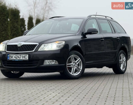 Черный Шкода Октавия, объемом двигателя 1.6 л и пробегом 246 тыс. км за 8300 $, фото 1 на Automoto.ua