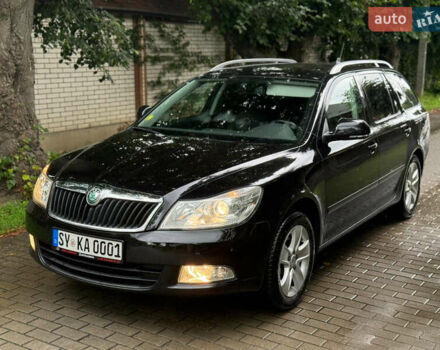 Черный Шкода Октавия, объемом двигателя 1.6 л и пробегом 200 тыс. км за 12300 $, фото 1 на Automoto.ua