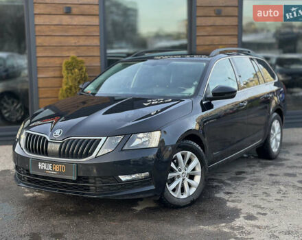 Чорний Шкода Октавія, об'ємом двигуна 1.6 л та пробігом 259 тис. км за 14200 $, фото 1 на Automoto.ua