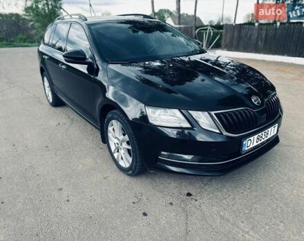 Черный Шкода Октавия, объемом двигателя 2 л и пробегом 295 тыс. км за 12999 $, фото 1 на Automoto.ua