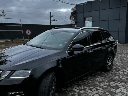 Черный Шкода Октавия, объемом двигателя 2 л и пробегом 250 тыс. км за 15000 $, фото 1 на Automoto.ua