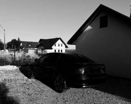 Черный Шкода Октавия, объемом двигателя 1.4 л и пробегом 135 тыс. км за 11900 $, фото 1 на Automoto.ua