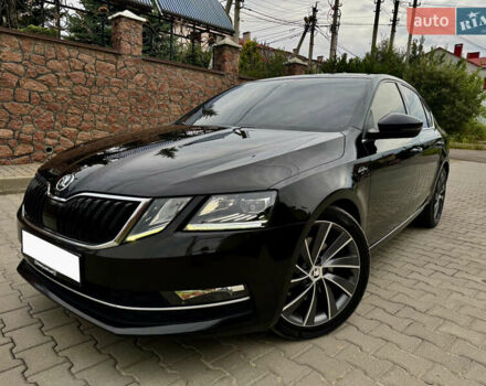 Чорний Шкода Октавія, об'ємом двигуна 2 л та пробігом 216 тис. км за 18400 $, фото 1 на Automoto.ua