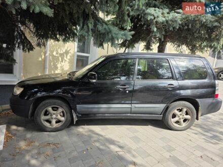 Черный Шкода Октавия, объемом двигателя 2 л и пробегом 262 тыс. км за 14999 $, фото 1 на Automoto.ua
