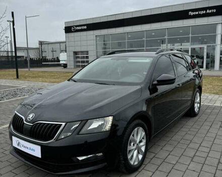 Черный Шкода Октавия, объемом двигателя 1.6 л и пробегом 218 тыс. км за 13999 $, фото 1 на Automoto.ua