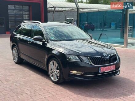 Черный Шкода Октавия, объемом двигателя 2 л и пробегом 214 тыс. км за 18500 $, фото 1 на Automoto.ua