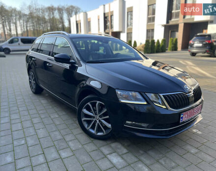 Черный Шкода Октавия, объемом двигателя 1.97 л и пробегом 243 тыс. км за 18650 $, фото 1 на Automoto.ua