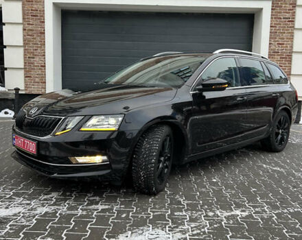 Черный Шкода Октавия, объемом двигателя 2 л и пробегом 203 тыс. км за 19500 $, фото 1 на Automoto.ua