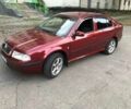 Красный Шкода Октавия, объемом двигателя 1.6 л и пробегом 300 тыс. км за 5500 $, фото 1 на Automoto.ua