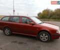 Красный Шкода Октавия, объемом двигателя 1.6 л и пробегом 282 тыс. км за 5100 $, фото 1 на Automoto.ua