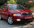 Красный Шкода Октавия, объемом двигателя 1.6 л и пробегом 188 тыс. км за 5750 $, фото 1 на Automoto.ua