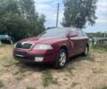 Красный Шкода Октавия, объемом двигателя 2 л и пробегом 376 тыс. км за 5592 $, фото 1 на Automoto.ua