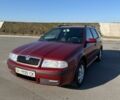 Красный Шкода Октавия, объемом двигателя 1.6 л и пробегом 250 тыс. км за 6000 $, фото 1 на Automoto.ua