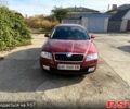 Красный Шкода Октавия, объемом двигателя 2 л и пробегом 253 тыс. км за 5700 $, фото 1 на Automoto.ua