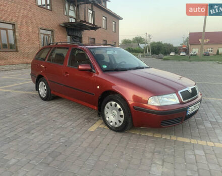 Красный Шкода Октавия, объемом двигателя 1.6 л и пробегом 202 тыс. км за 5650 $, фото 4 на Automoto.ua