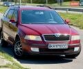 Красный Шкода Октавия, объемом двигателя 1.6 л и пробегом 280 тыс. км за 4200 $, фото 1 на Automoto.ua