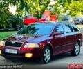 Красный Шкода Октавия, объемом двигателя 1.8 л и пробегом 173 тыс. км за 5750 $, фото 1 на Automoto.ua