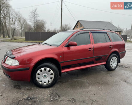 Красный Шкода Октавия, объемом двигателя 1.6 л и пробегом 316 тыс. км за 5980 $, фото 1 на Automoto.ua