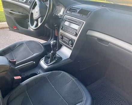 Красный Шкода Октавия, объемом двигателя 1.39 л и пробегом 278 тыс. км за 6500 $, фото 12 на Automoto.ua