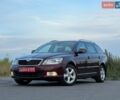 Красный Шкода Октавия, объемом двигателя 1.6 л и пробегом 195 тыс. км за 8999 $, фото 1 на Automoto.ua