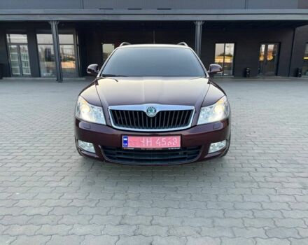 Красный Шкода Октавия, объемом двигателя 1.8 л и пробегом 128 тыс. км за 8190 $, фото 1 на Automoto.ua