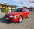 Красный Шкода Октавия, объемом двигателя 1.6 л и пробегом 202 тыс. км за 6900 $, фото 1 на Automoto.ua