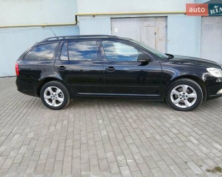 Красный Шкода Октавия, объемом двигателя 2 л и пробегом 215 тыс. км за 8650 $, фото 1 на Automoto.ua