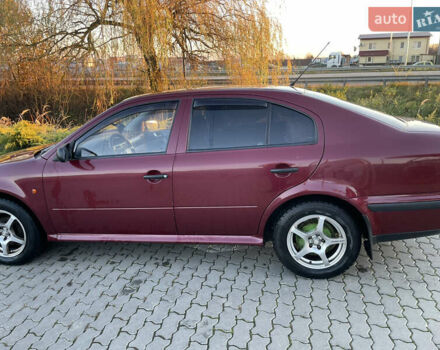 Красный Шкода Октавия, объемом двигателя 1.6 л и пробегом 280 тыс. км за 2650 $, фото 5 на Automoto.ua