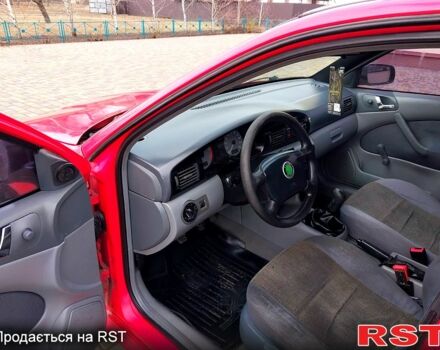 Красный Шкода Октавия, объемом двигателя 1.6 л и пробегом 280 тыс. км за 3850 $, фото 9 на Automoto.ua