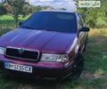 Красный Шкода Октавия, объемом двигателя 1.6 л и пробегом 257 тыс. км за 3500 $, фото 1 на Automoto.ua