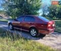 Красный Шкода Октавия, объемом двигателя 2 л и пробегом 287 тыс. км за 5000 $, фото 5 на Automoto.ua