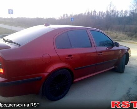 Красный Шкода Октавия, объемом двигателя 1.8 л и пробегом 253 тыс. км за 4400 $, фото 3 на Automoto.ua