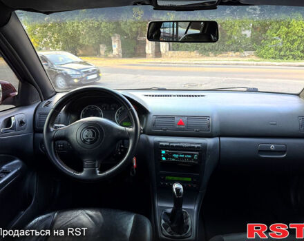 Червоний Шкода Октавія, об'ємом двигуна 1.8 л та пробігом 258 тис. км за 5199 $, фото 8 на Automoto.ua