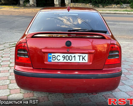 Червоний Шкода Октавія, об'ємом двигуна 1.8 л та пробігом 258 тис. км за 5199 $, фото 5 на Automoto.ua