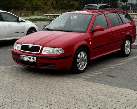 Красный Шкода Октавия, объемом двигателя 1.6 л и пробегом 229 тыс. км за 3599 $, фото 2 на Automoto.ua