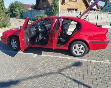 Красный Шкода Октавия, объемом двигателя 1.6 л и пробегом 225 тыс. км за 4999 $, фото 9 на Automoto.ua
