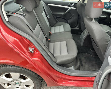 Червоний Шкода Октавія, об'ємом двигуна 1.6 л та пробігом 211 тис. км за 7999 $, фото 66 на Automoto.ua