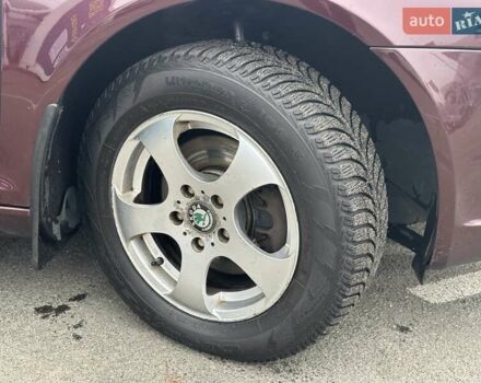 Красный Шкода Октавия, объемом двигателя 1.8 л и пробегом 168 тыс. км за 7490 $, фото 11 на Automoto.ua