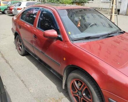 Красный Шкода Октавия, объемом двигателя 1.8 л и пробегом 360 тыс. км за 2800 $, фото 1 на Automoto.ua