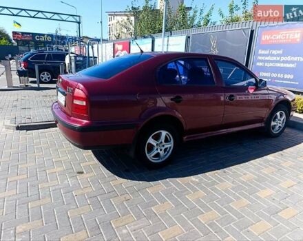 Красный Шкода Октавия, объемом двигателя 1.6 л и пробегом 310 тыс. км за 3500 $, фото 1 на Automoto.ua