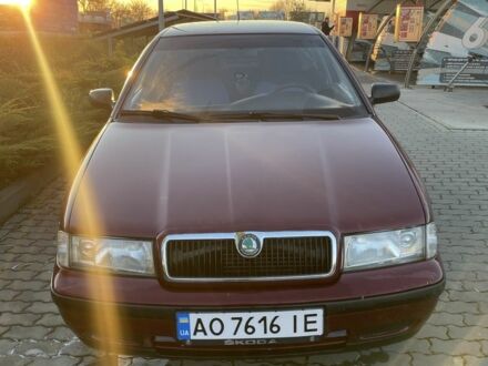 Красный Шкода Октавия, объемом двигателя 1.6 л и пробегом 280 тыс. км за 2650 $, фото 1 на Automoto.ua