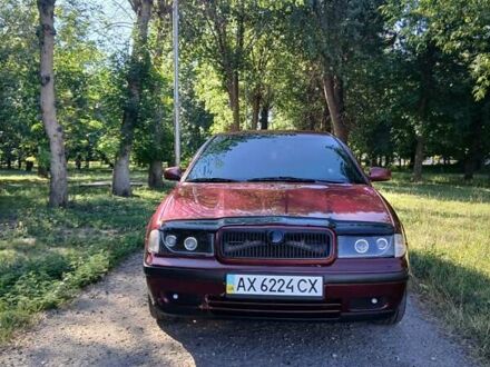 Шкода Октавия 1999 в Первомайском на Automoto.ua Красный Шкода Октавия, объемом двигателя 2 л и пробегом 287 тыс. км за 5000 $, фото 1 на Automoto.ua